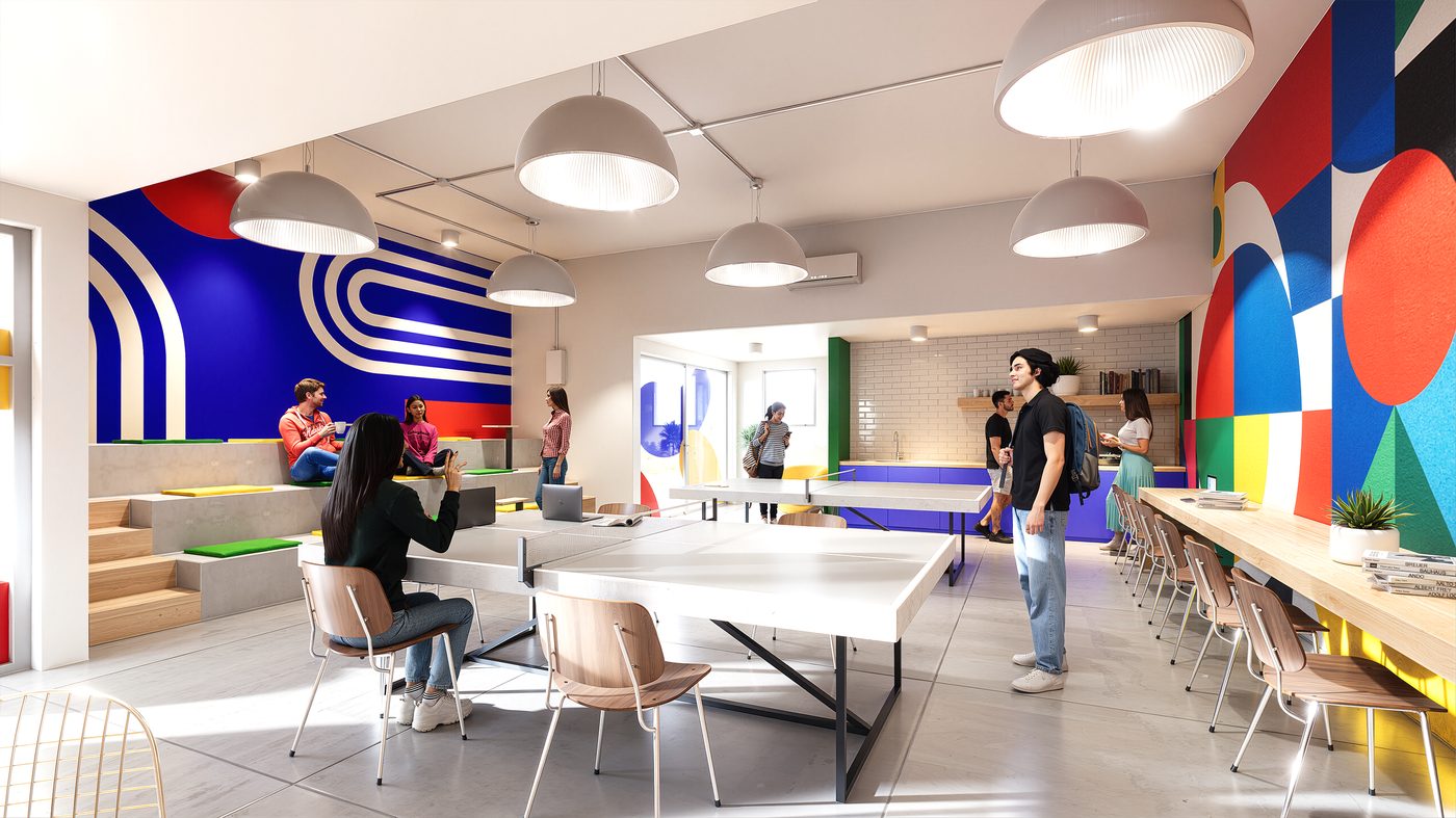 Interior cowork con murales de inspiración Bauhaus